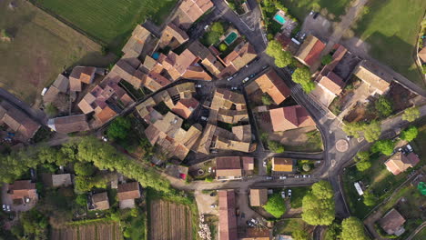 Aerial-top-down-shot-over-Campagne-village-France-rural-town-peaceful-area